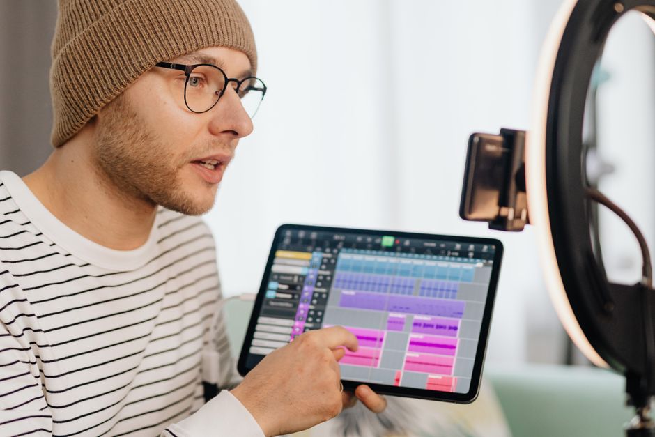 A creator editing their TikTok profile settings on a smartphone screen showing username availability check