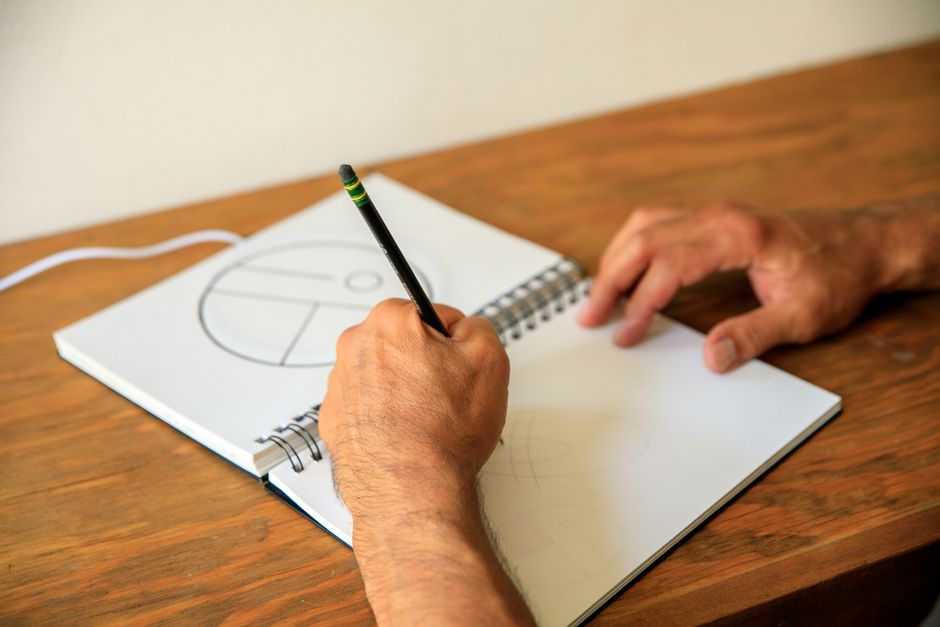 A designer sketchpad displaying color swatches and stylized typography options for TikTok profile handles