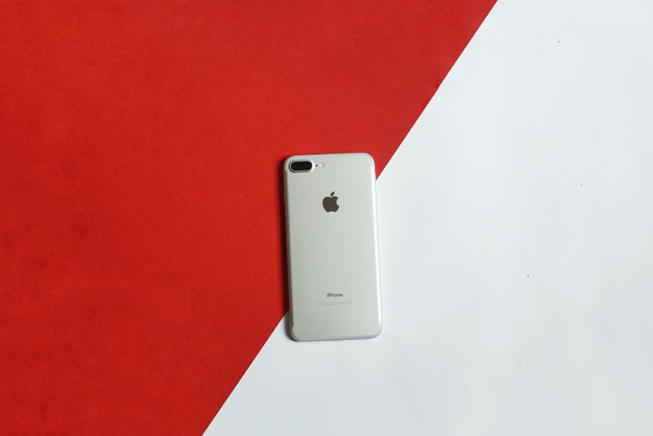 A flat-lay smartphone display showing a creative TikTok handle input field with green checkmark availability