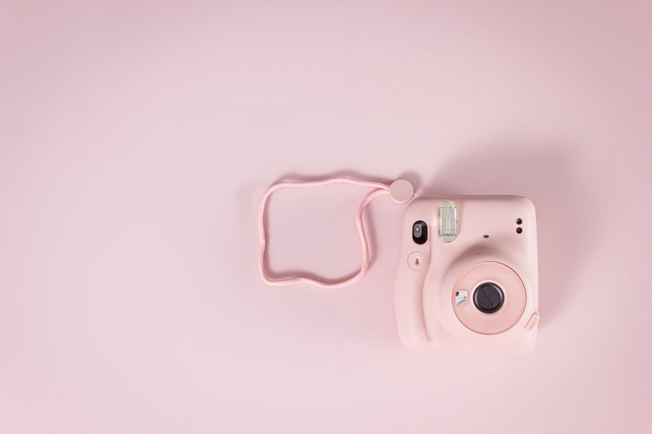 Aesthetic pastel-themed notebook beside a coffee mug, symbolizing creative brainstorming for private usernames