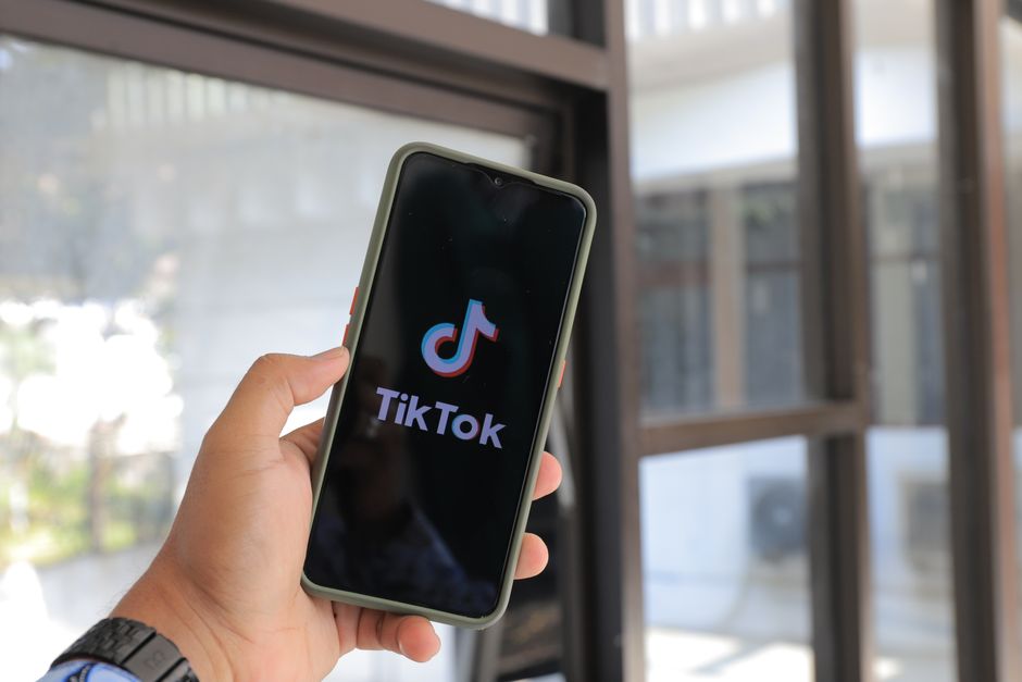 Close-up of the TikTok profile editing interface highlighting the nickname field and save button