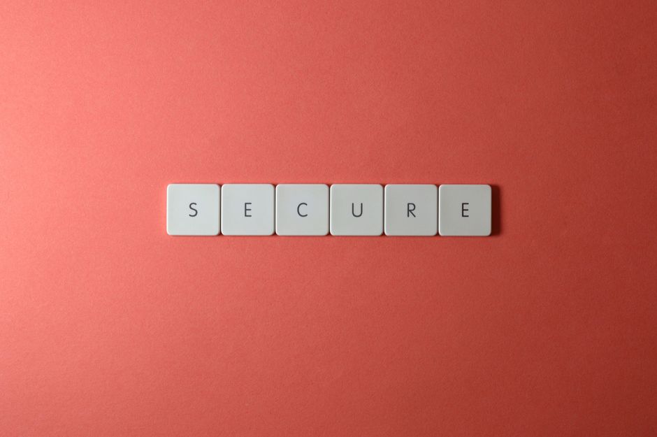 Digital security conceptual graphic featuring a glowing lock icon, account shield verification, and clean cyber safety icons