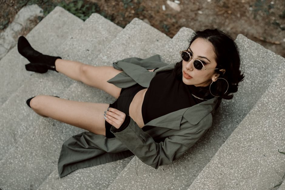 Edgy fashion creator posing with street-style flash photography