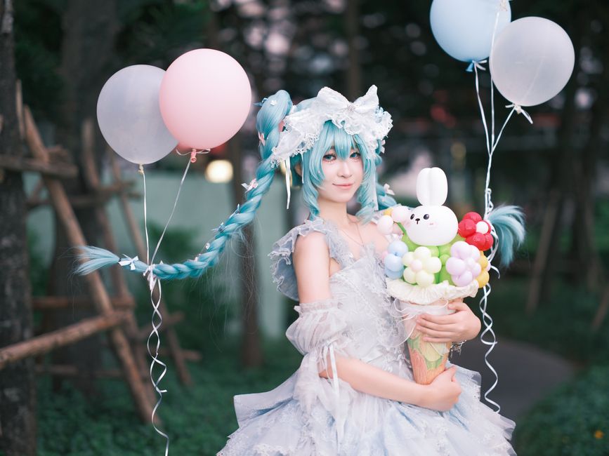 Kawaii pastel flat lay featuring strawberry milk, mochi sweets, and plush accessories