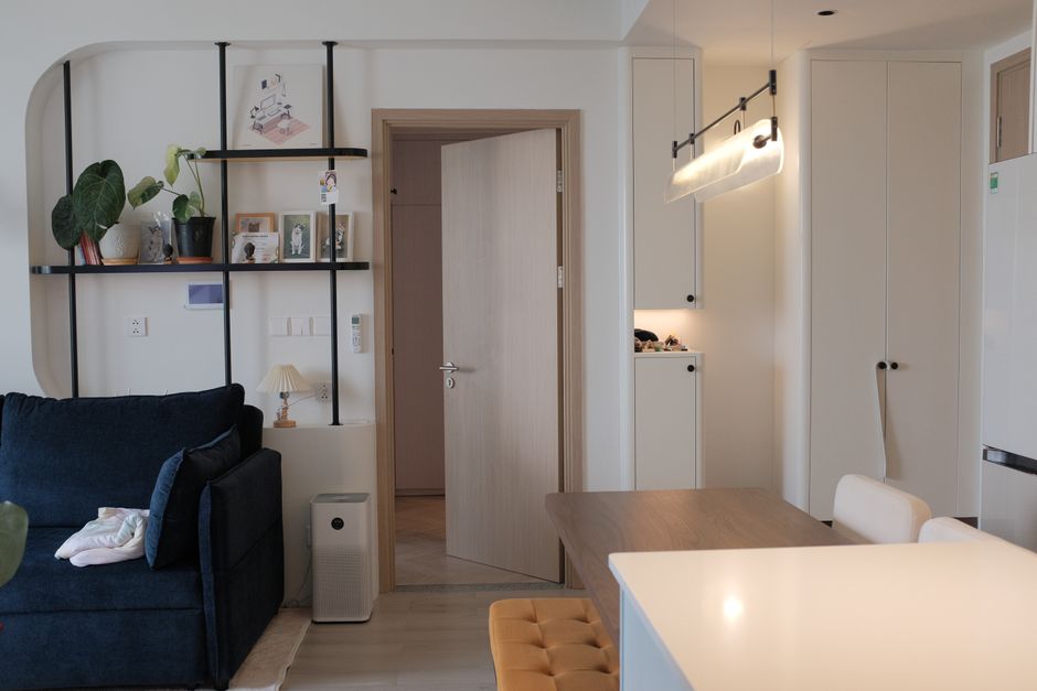 Modern minimalist neon studio lights illuminating a luxury vanity table with camera gear