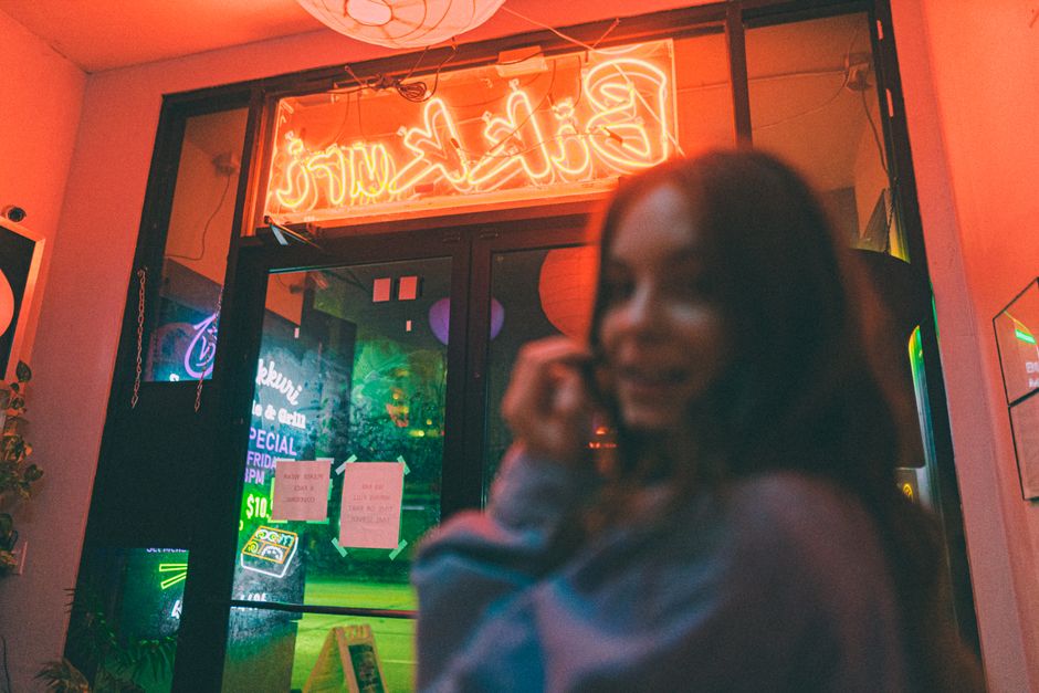 Moody neon-lit neon aesthetic room with cinematic dark shadows