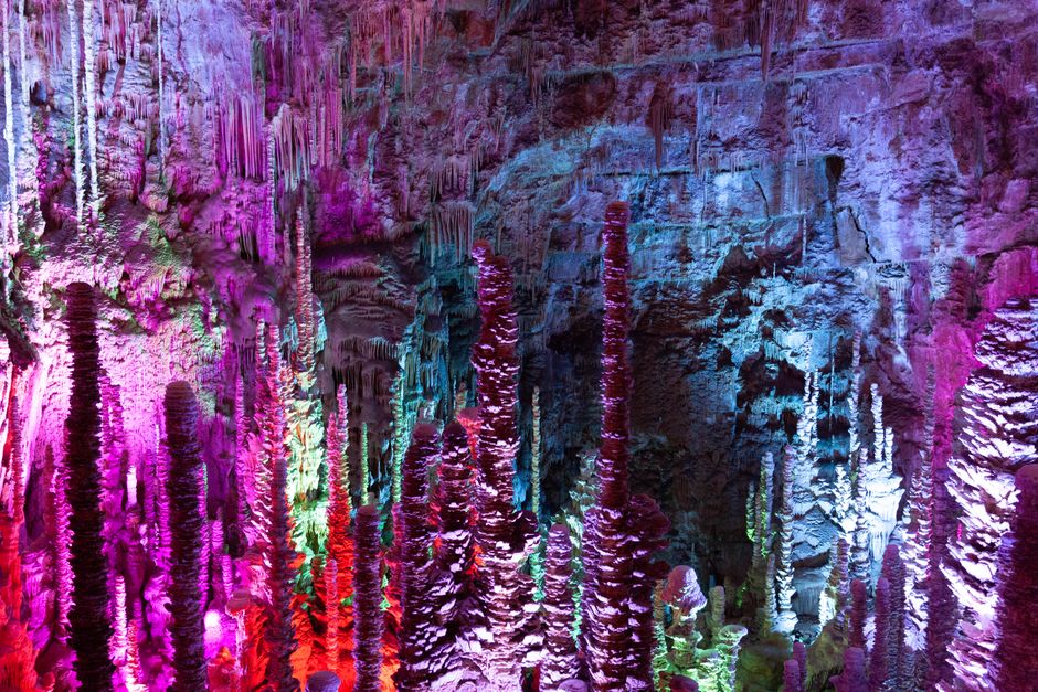 Neon cave transformation circle in Adopt Me glowing with bright rainbow effects
