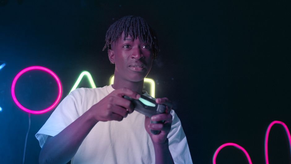 Neon gaming setup with TikTok streaming interface on screen