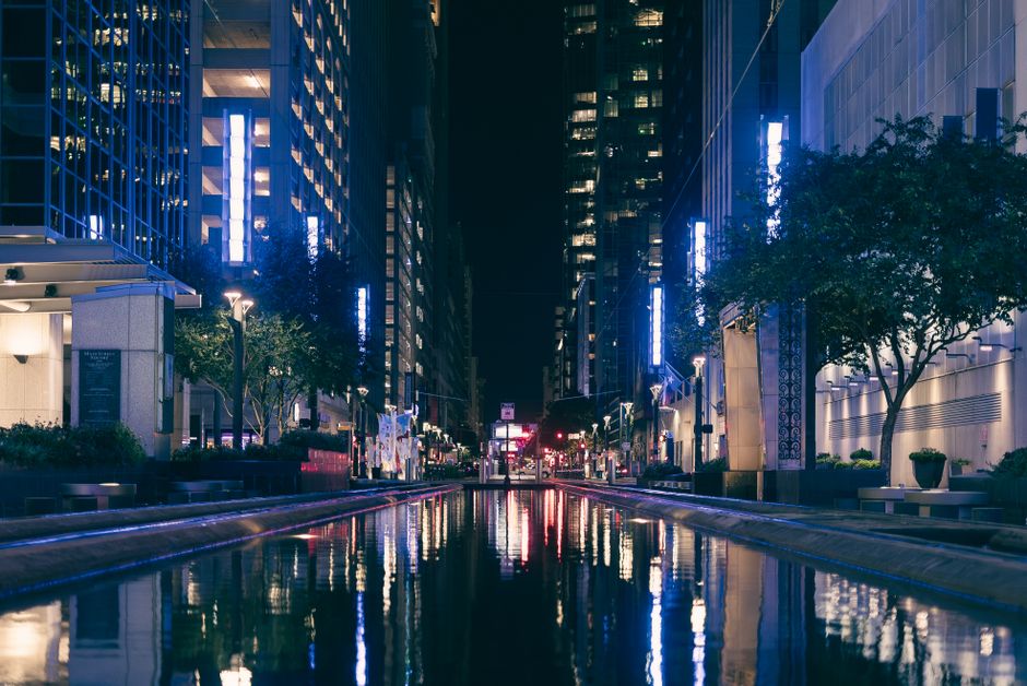 Urban nighttime scene with neon reflections, suited for edgy and streetwear TikTok concepts