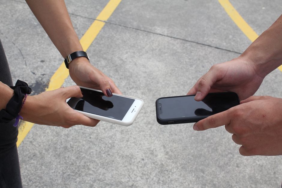User comparing multiple creative handle options on a digital tablet interface