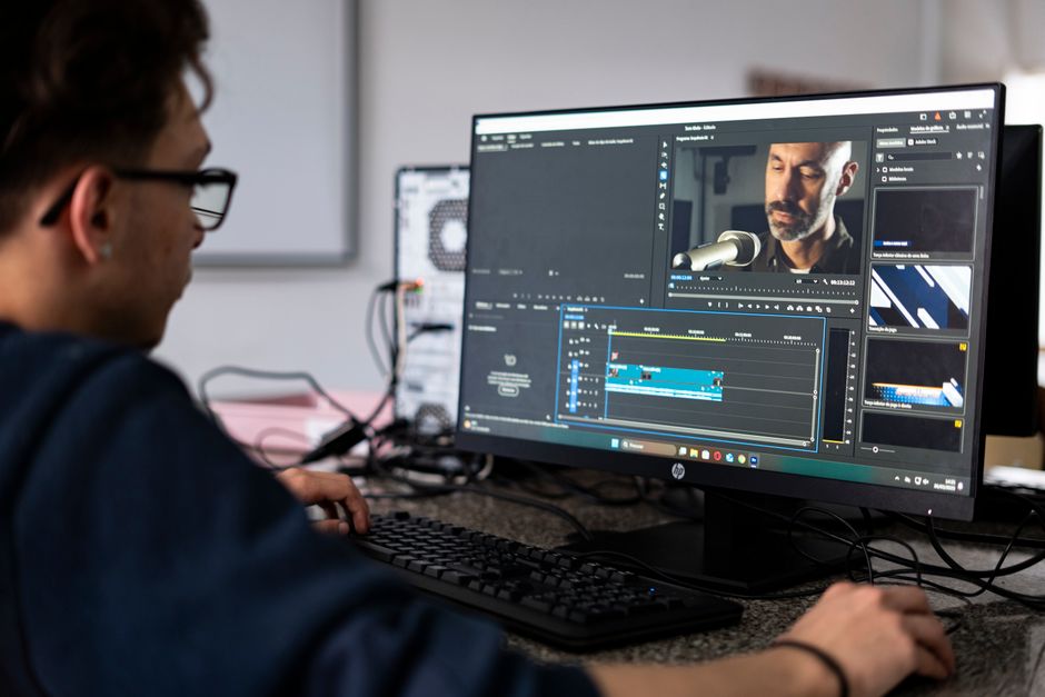 Video editor workspace showing timeline tracks, keyframes, and color grading panels